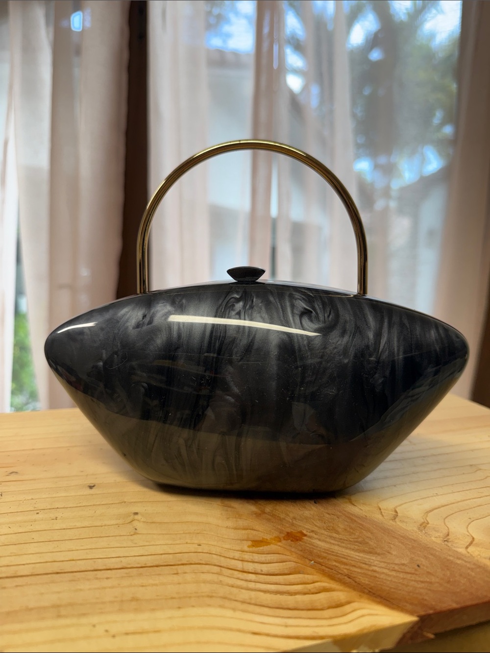 sculptural acrylic evening clutch